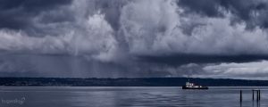 March storm view and tugboat from Kingston WA